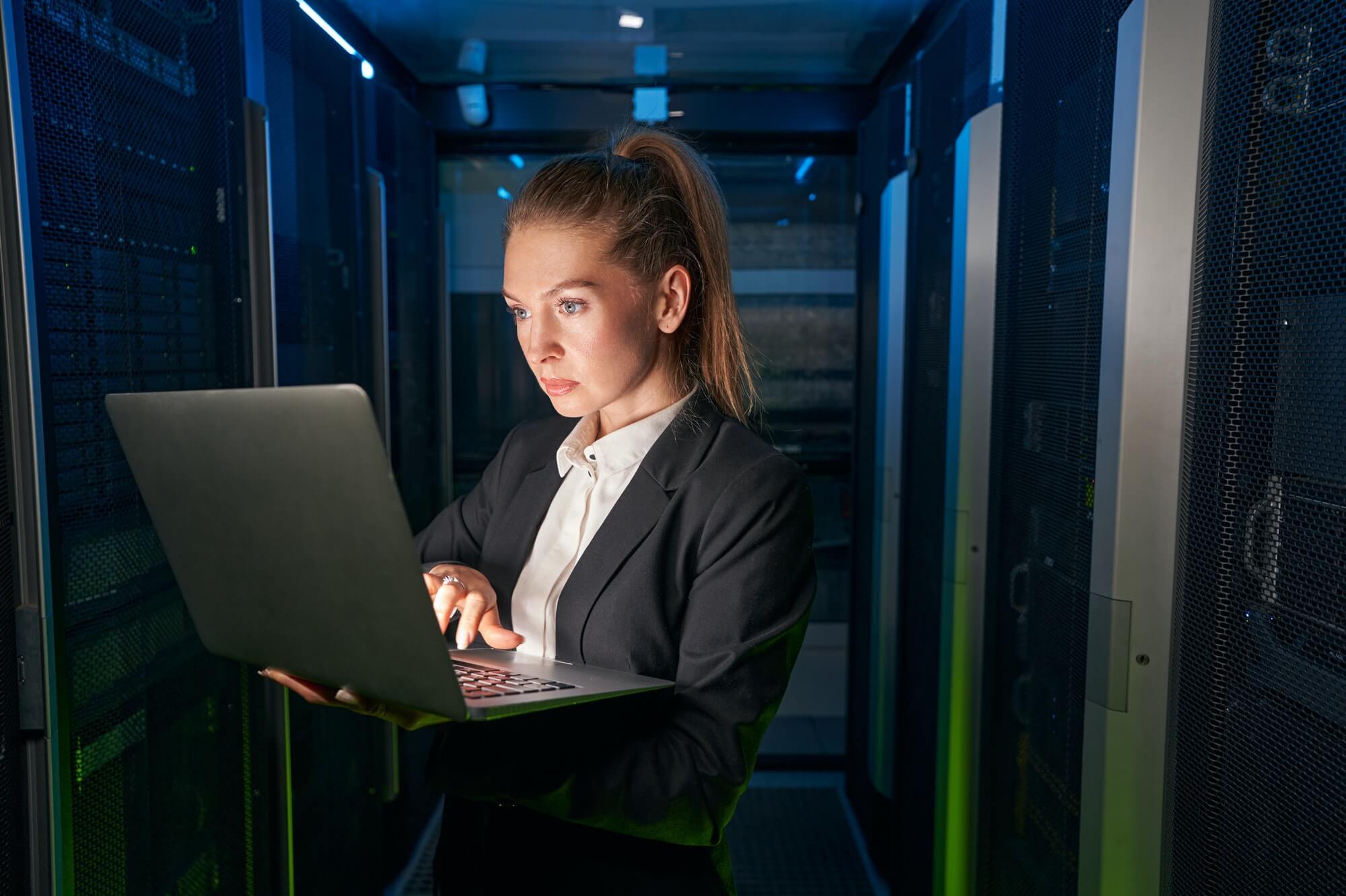 young-attractive-woman-working-in-server-room-1.jpg